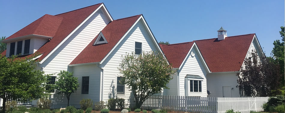 large house white siding painting